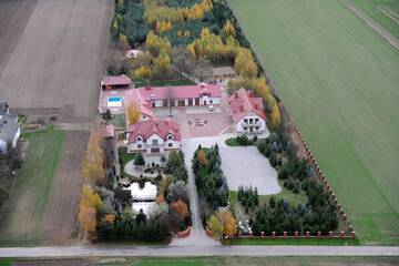 Фото Загородные дома Ośrodek Zacisze г. Giewartów 1